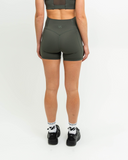Back view showcasing sculpted waistband and tonal logo
