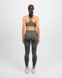 Back view showing adjustable straps and breathable mesh pane