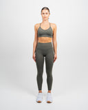 Full-body front view showing Synergy Sports Bra and leggings in matching Khaki