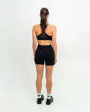full Back view of Synergy Shorts with tonal Nexletica logo detail