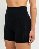 Close-up of pocket seam with Nexletica branding

